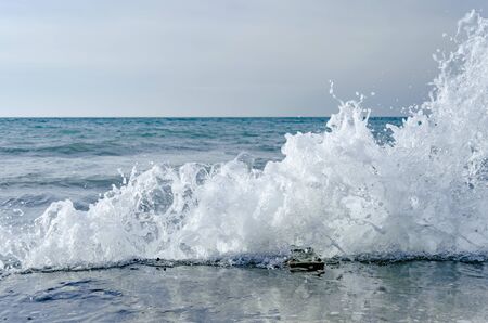 Splashing wave on the Black sea in the day.の写真素材