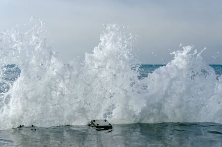 Splashing wave on the Black sea in the day.の写真素材
