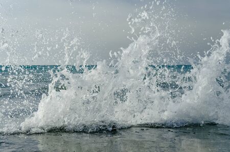 Splashing wave on the Black sea in the day.の写真素材