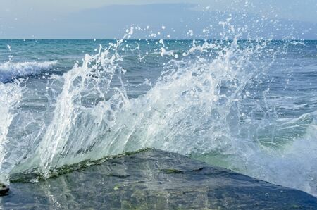 Splashing wave on the Black sea in the day.の写真素材