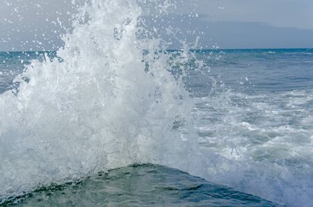 Splashing wave on the Black sea in the day.の写真素材