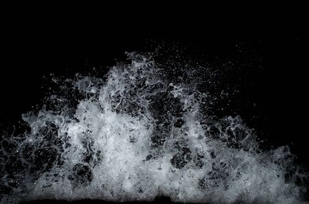 Splashing wave on the Black sea in the night.の写真素材