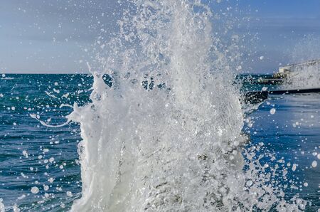 Splashing wave on the Black sea in the sunny day.の写真素材