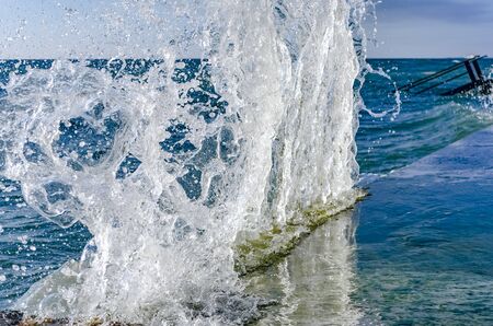 Splashing wave on the Black sea in the sunny day.の写真素材