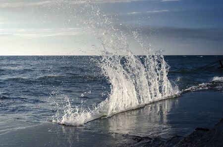 Splashing wave on the Black sea in the sunny day.の写真素材