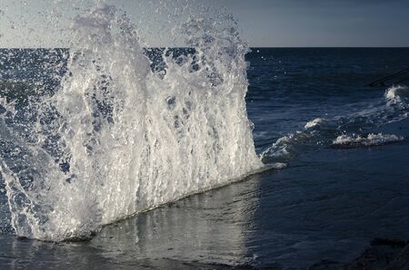 Splashing wave on the Black sea in the sunny day.の写真素材