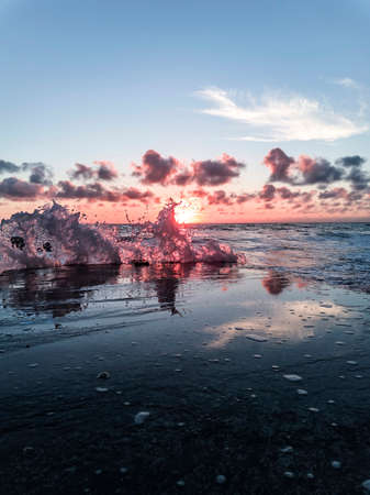 Splashing wave on the Black sea in the evening.の写真素材