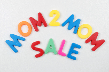 Mom To Mom Sale Sign In Magnetic Bright Colored Letters On Refrigeratorの写真素材