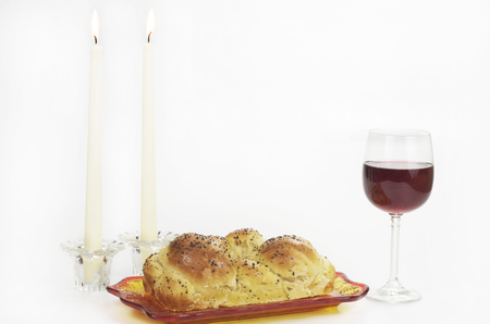 Shabbat Observance, Challah, Two Lit Candles, Glass of Wineの写真素材