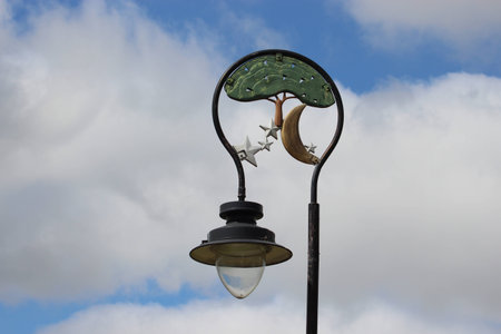 Decorative lamp with tree, moon and starの写真素材