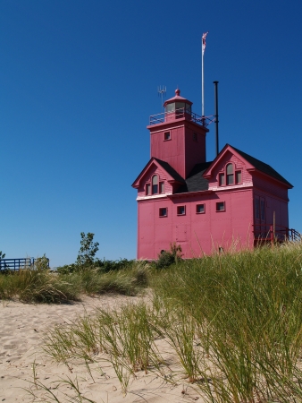Big Red Lighthouse on the beach in Holland Michiganの写真素材