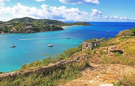 Block guard house overlooking Deep Bay near Old Fort Barrington, Five Islands Peninsula between Deep Bay and St. Johnâs Harbour, Antigua Barbuda Lesser Antilles, West Indies, Caribbean, Goat Hill.の写真素材