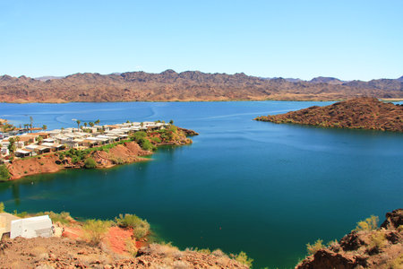 View of Lake Havasu and homes near Lake Havasu City, Arizona, USA with view of California and blue sky copy space.の写真素材