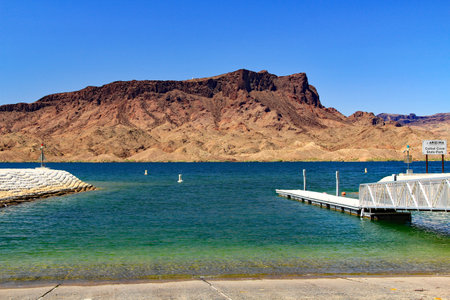 Boat landing on Lake Havasu and Colorado River near Lake Havasu City, Arizona, USA with view of California and blue sky copy space.の写真素材
