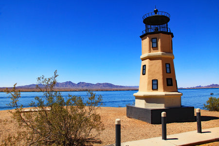 Replica of the Split Rock lighthouse in Lake Havasu City, Arizona, USA on lake Havasu with blue sky copy space.の写真素材