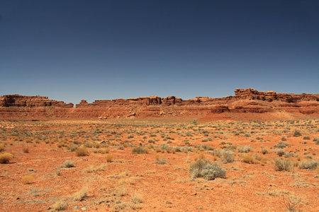 Red rock butte formation in Utah, USA in San Juan County, Monument Valley, on the Navajo Nation Reservation with blue sky space.の写真素材