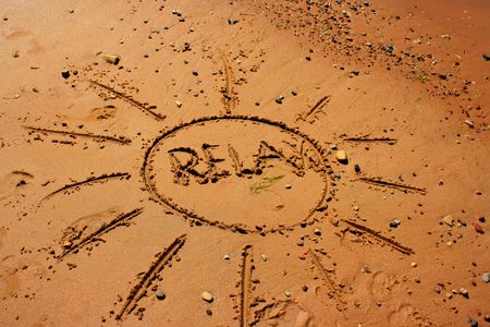 relax sign on beachの写真素材