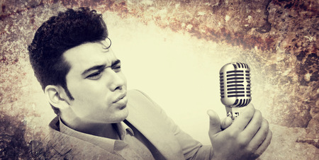 man is very similar to the King of Rock and Roll Elvis Presleyの写真素材