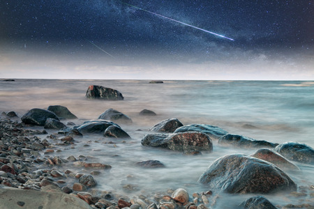 rocks into the sea. の写真素材