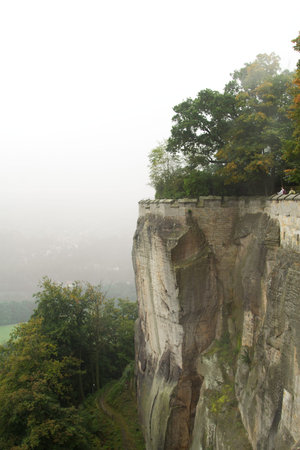 fortress . autumn fog and the mountain with the castle.の写真素材
