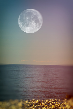 moon over the sea. Baltic Sea in summer. の写真素材
