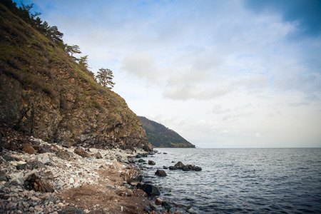 rocky coast of Lake Baikal. Autumn in Siberia.の写真素材