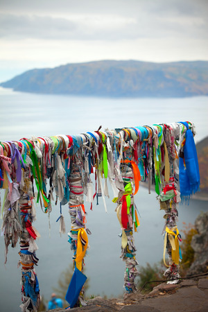 Island on Lake Baikal in the autumn. The most beautiful and wonderful little seaの写真素材