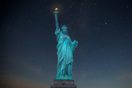 Statue of Liberty on the background of the starry sky and the Milky Way