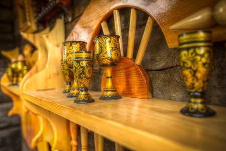 production of old folk Russian Khokhloma wooden tableware Paintedの写真素材