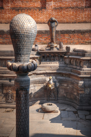 snake pit. hindu mythology in the water reservoirs in Bhaktapur Durbar square , Kathmandu, Nepal,Asiaの写真素材