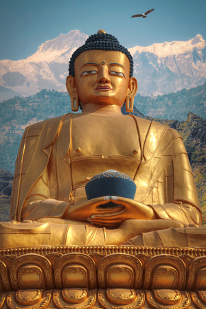 Golden Buddha in Kathmandu on a background of the Himalayas mountainsの写真素材