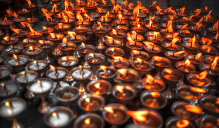 Kathmandu candles burn for religious purposes. Nepalの写真素材