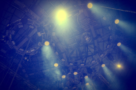 stage before the concert shines the beams of searchlightsの写真素材