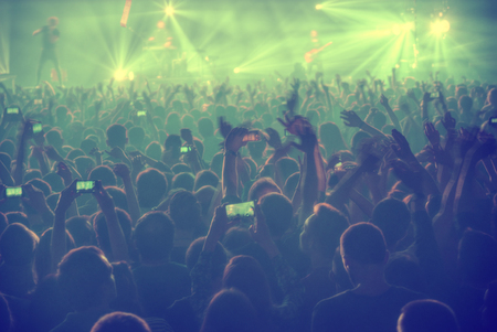 People at the concert are waiting for the showのeditorial素材