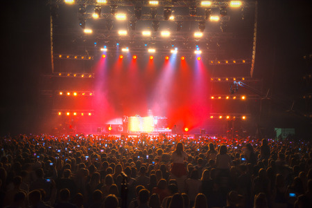 Concert in the closed hall with a picture on TVの写真素材