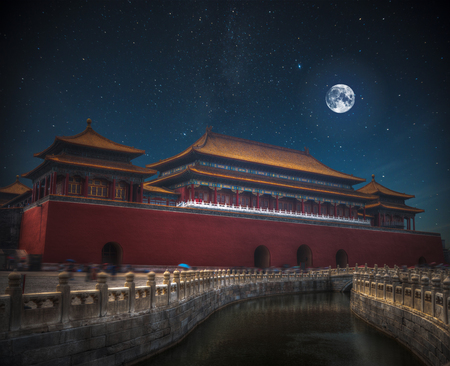 The Forbidden City is the largest palace complex in the world. At night the moon and stars shine.のeditorial素材