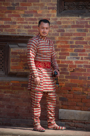 Bhaktapur, Nepal-November 19: A family dress of red color during a traditional wedding in Bhaktapur November 19, 2017.のeditorial素材