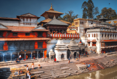 Kathmandu, Nepal - November 22, 2016: The cremation ceremony along the holy Bagmati River in Bhasmeshvar Ghat at Pashupatinath temple in Kathmandu.のeditorial素材