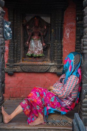 BHAKTAPUR, NEPAL - DECEMBER 14, 2017: women from Nepal, in Durbar Square, Kathmanduのeditorial素材