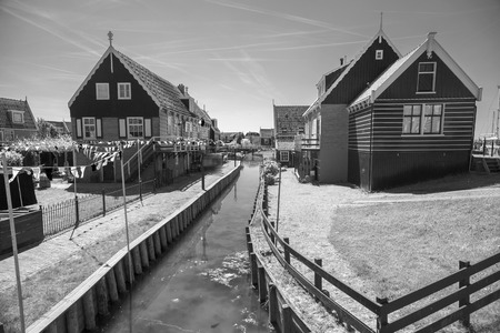 black and white photography. Traditional houses in Holland town Volendam, Netherlandsのeditorial素材