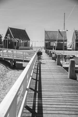 black and white photography. Traditional houses in Holland town Volendam, Netherlandsのeditorial素材