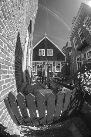 black and white photography. Traditional houses in Holland town Volendam, Netherlandsのeditorial素材