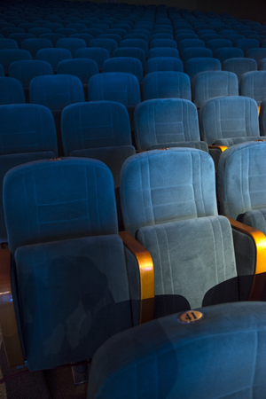 empty auditorium with seats before the start of the performanceの写真素材