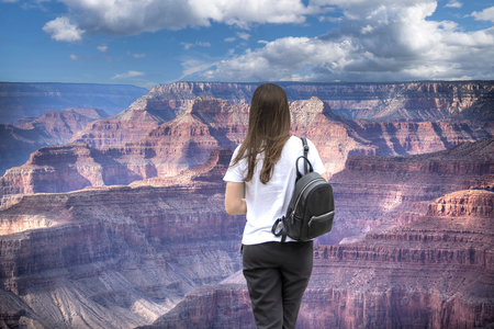woman walks the Grand Canyon in the USAの写真素材
