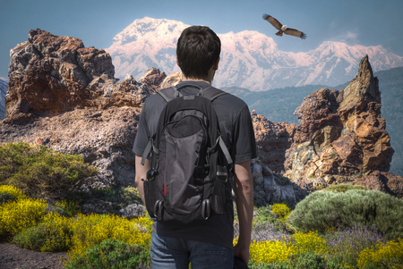 Man in the mountains with a backpackの写真素材