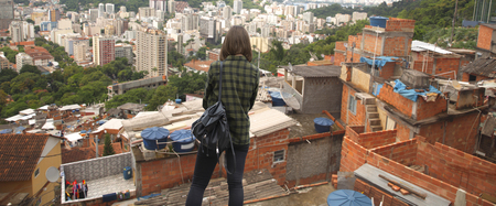 A woman walks through the faves of the city of Rio.の写真素材