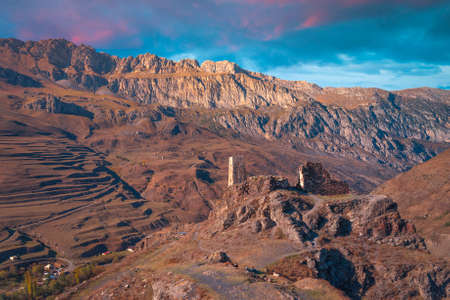 tower on the background of the caucasus mountains. North ossetiaのeditorial素材