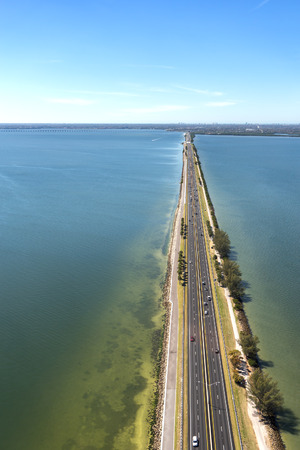 Aerial view of highway crossing Old Tampa Bay, Florida towards Clearwaterの写真素材