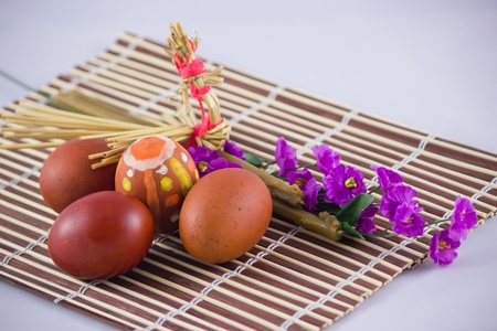 straw bird on Easter eggsの写真素材