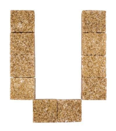 Alphabet of sugar on a white background close-upの写真素材